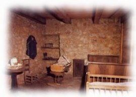 Le lit des parents, le berceau